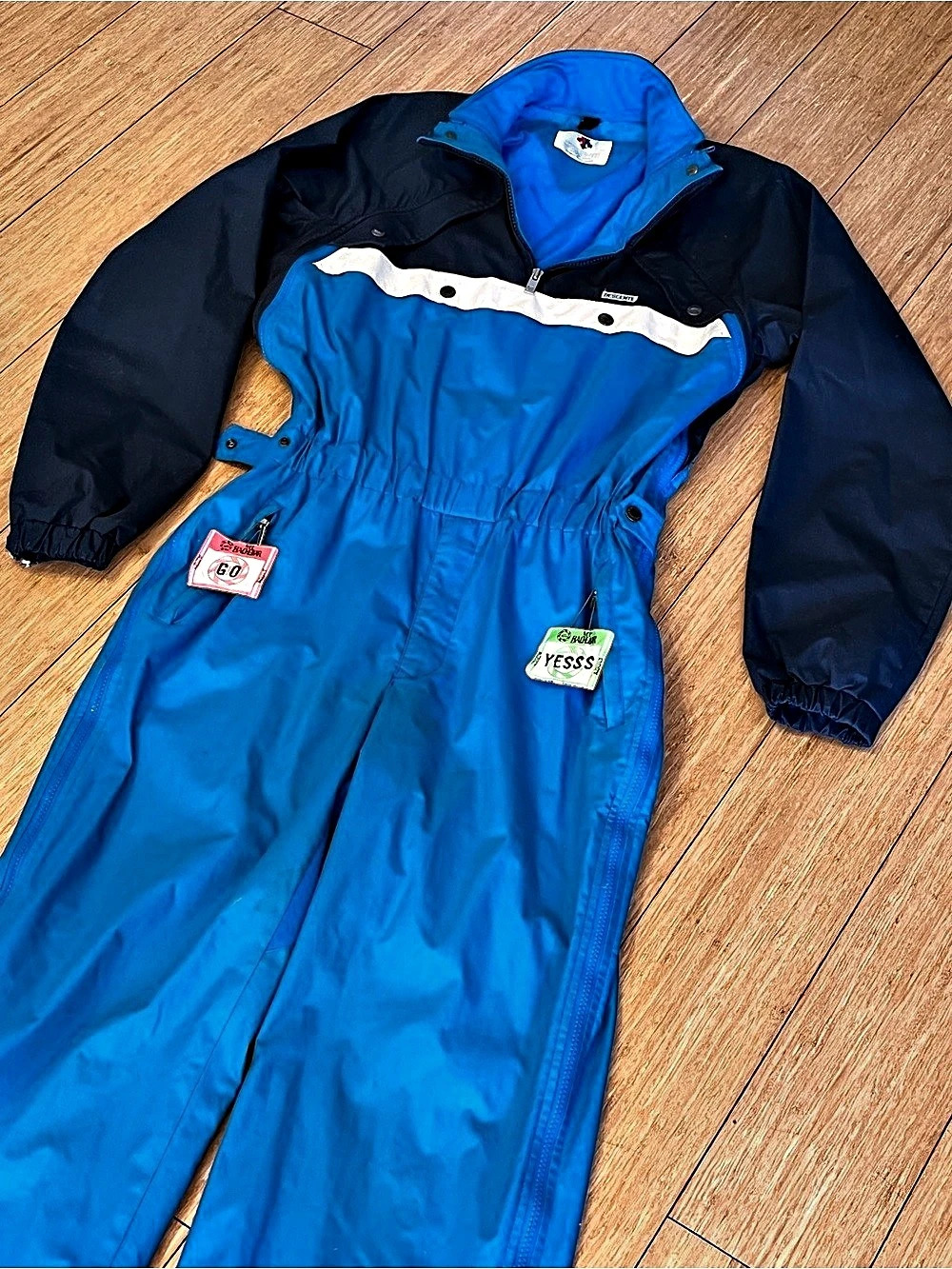 Vintage Descente Ski Suit with vintage lift tickets!